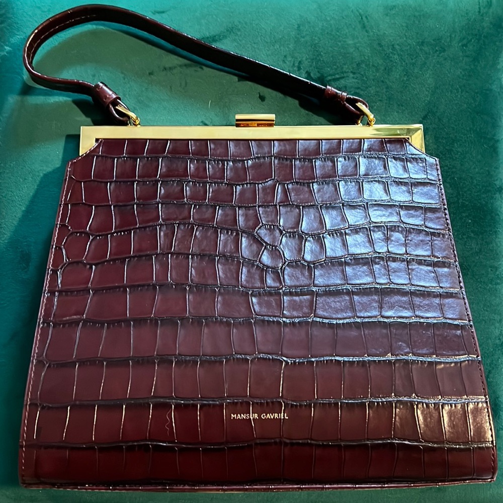 Mansur Gavriel Elegant Clasp top handle bag in brown crocodile.